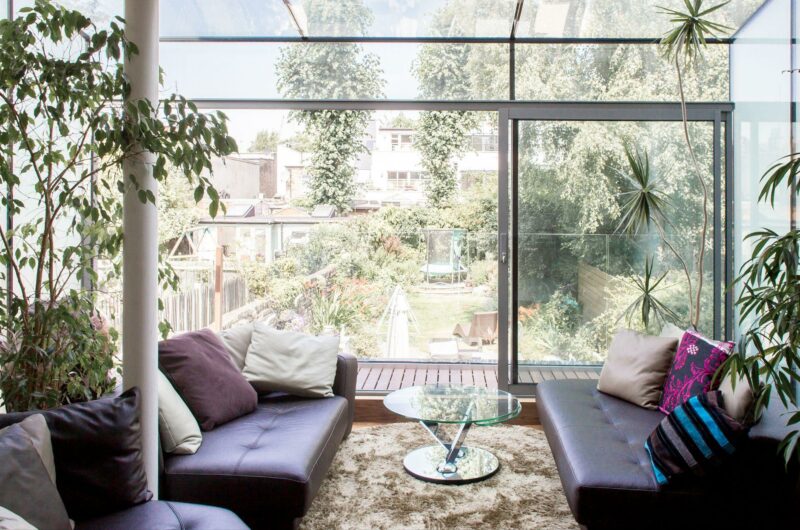 A living room overlooking a garden.